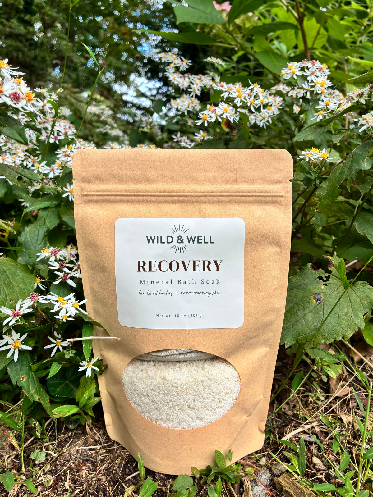 Wild & Well Recovery Mineral Bath Soak pouch outdoors
